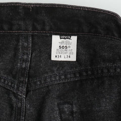 00'S Levi's 505 REGULAR FIT STRAIGHT LEG black denim tapered denim pants for men, size w33 cotton black type Vintage Second Hand